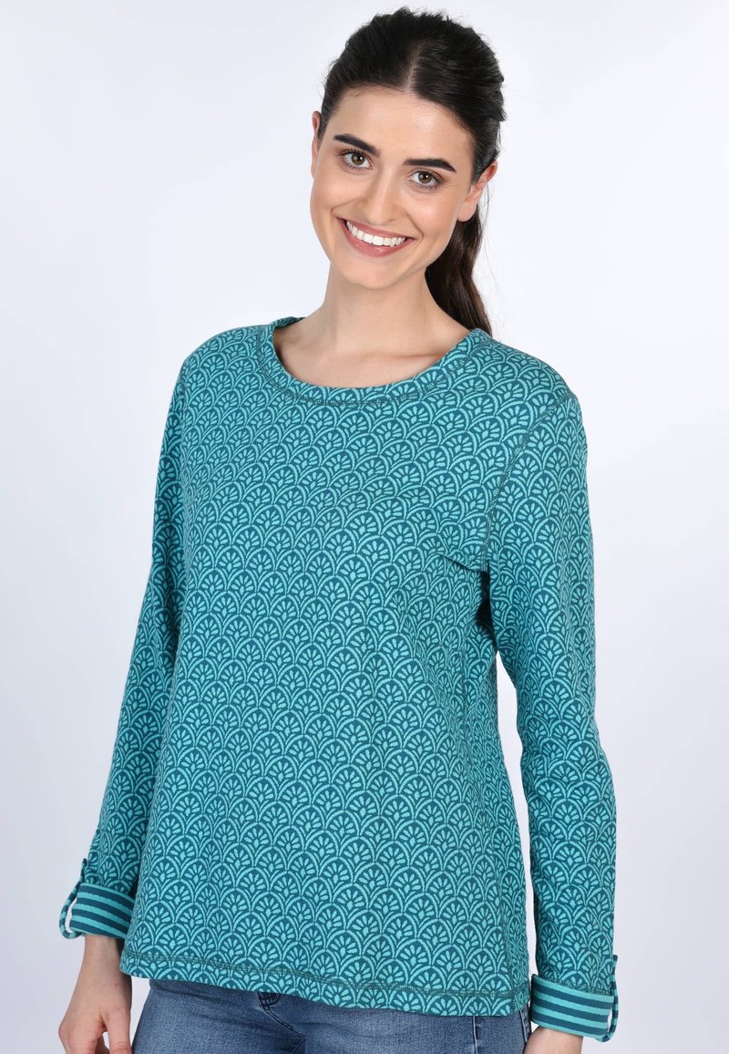 Teal Langarmshirt mit einem geometrischen Blattmuster, rundem Ausschnitt und gestreiften Bündchenakzenten. Aus einem weichen, strukturierten Stoff gefertigt.