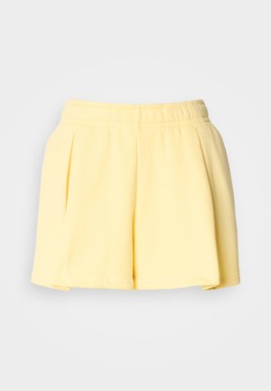 Gelbe plissierte Shorts aus weichem Stoff; elastischer Bund; lockere Passform; glatte Textur; Oberschenkellänge.