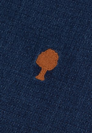 Navy fabric with a textured weave featuring an embroidered brown tree design. The tree is centered and has a stylized shape.