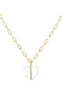 Gouden ketting met ovale schakels en een heldere hartbedel met een witte verticale streep in het midden.