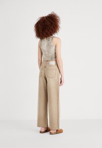 Edwin OLIVIA PANT - Široke nogavice - beige