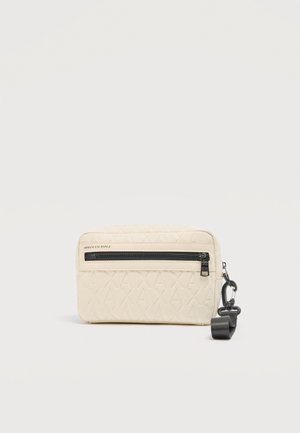 LIAM WRIST BAG UNISEX - Toaletna torbica - cream