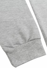 Polsino di felpa grigia in cotone con una texture morbida e un orlo a costine, caratterizzato da un sottile motivo melange e una finitura liscia.