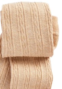 Helle beige Strumpfhosen aus Strick mit strukturierten vertikalen Streifen und Zopfmuster; weiches Material, flexibles Design, geeignet für verschiedene Anlässe.