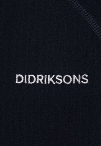 Navy fabric with a smooth texture, featuring white embroidered "DIDRIKSONS" branding at the center. Simple and clean design.