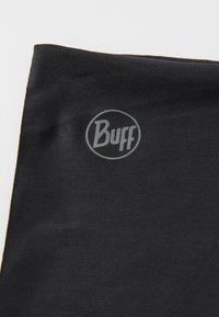 Czarny neck gaiter Buff z gładkiego materiału, z okrągłym, szarym logo. Design jest bezszwowy i ma kształt tuby, co gwarantuje wszechstronność.