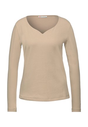 Beige langærmet top med ribbet tekstur, featuring en dyb V-udskæring og tætsiddende silhuet, fremstillet af blødt, strækbart stof.