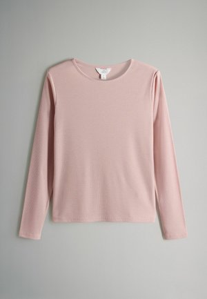 Rosa Langarmoberteil aus geripptem Stoff mit rundem Ausschnitt und lockerer Passform. Keine sichtbaren Muster oder Grafiken.