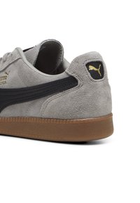 Puma LIGA - Tenisice - concrete gray black gold