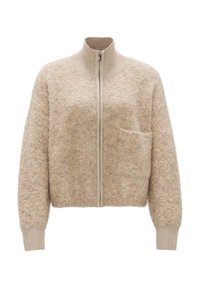 Beige, textured zip-up cardigan with a high collar, ribbed cuffs, and a small front pocket. Soft, fuzzy material with a relaxed fit.