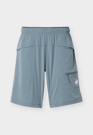 Shorts à taille élastique bleu clair avec poches latérales à rabat et une poche zippée ornée d'un logo mammouth blanc sur la jambe inférieure droite.