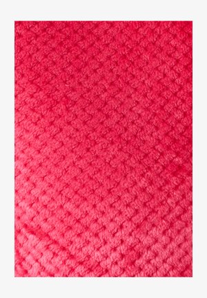 Textured fabric in vibrant pink, featuring a diamond pattern. The surface appears soft with a plush texture.