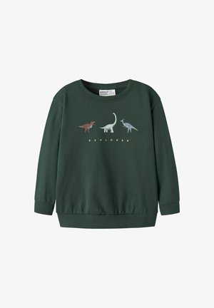 Sweat-shirt enfant vert foncé avec trois illustrations de dinosaures et le mot "EXPLORER" en dessous sur la poitrine.