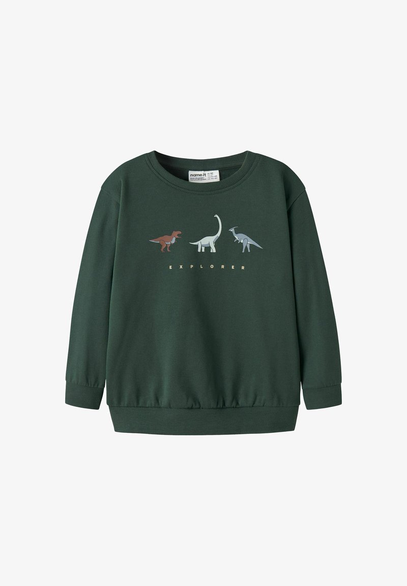 Sweat-shirt enfant vert foncé avec trois illustrations de dinosaures et le mot "EXPLORER" en dessous sur la poitrine.