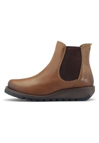 Brown leather ankle boot with elastic panels, round toe, and textured rubber sole. Features stitched accents and a subtle logo detail.
