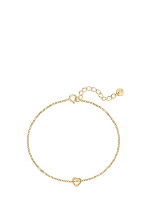 Bracelet délicat en chaîne d'or avec un petit pendentif cœur ouvert et un fermoir ajustable avec des maillons rallonge.