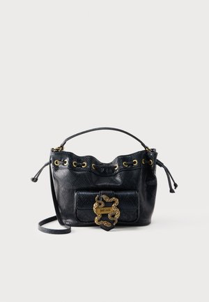 Black textured leather bucket bag with gold grommets, drawstring closure, front pocket, and decorative gold snake emblem on flap.