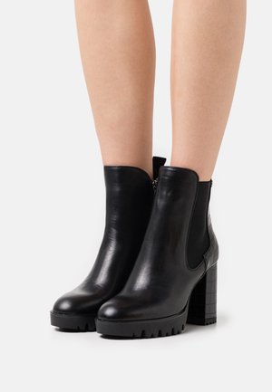 XTI, Bottines à talons hauts - black