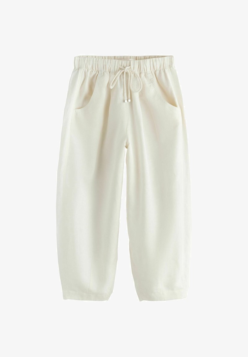 Ikrémszínű, bő szabású nadrág elasztikus derékpánttal és húzózsinórral, oldalzsebekkel és keskenyedő szárakkal.