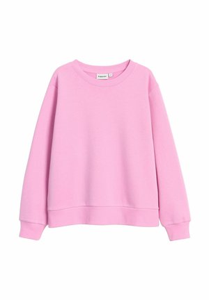 Jasnoróżowy sweter z okrągłym dekoltem, długimi rękawami i ściągaczami. Wykonany z miękkiego materiału, o luźnym kroju i bez wzorów.
