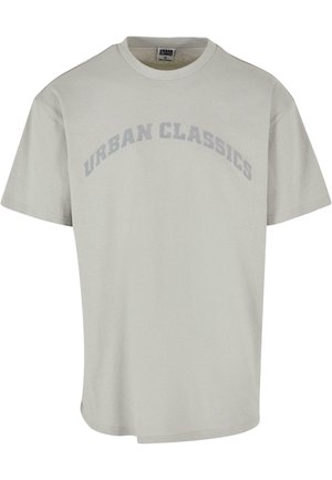 Jasnoszary, krótkorękawowy T-shirt z nadrukiem "URBAN CLASSICS" w zaokrąglonych, wyblakłych wielkich literach na klatce piersiowej, metka ze środka w rozmiarze medium.