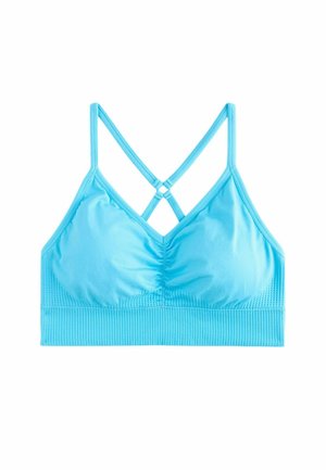 Vaaleansininen bralette, jossa on kerätty etuosa, ribbatut tekstuurit alaosassa ja ristikkäiset hihnat takana. Tasainen ja joustava kangas.