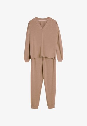 Brązowa, długosleeve top o dekolcie w kształcie V w luźnym kroju z bokami rozciętymi, dopasowana do spodni dresowych z tapered o elastycznych mankietach.