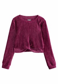 Fuchsia Cropped-Pullover aus strukturiertem Samt. Mit langen Ärmeln, einem runden Ausschnitt und einem geknoteten Frontdetail.