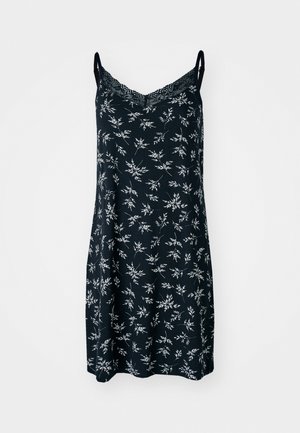 Abito nero senza maniche con motivo floreale bianco, dettagli in pizzo sul collo e vestibilità morbida. Tessuto liscio con una leggera texture.