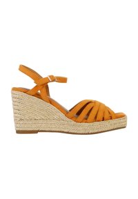 Orange suede wedge sandals with braided jute platform, featuring a strappy design and ankle strap with buckle. Textured finish.