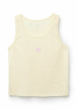 Cremefarbenes ärmelloses Tanktop mit einem kleinen hellrosa Herz in der Mitte der Brust.