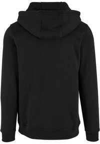 Felpa nera con cappuccio, che mostra un tessuto morbido, maniche lunghe e una vestibilità rilassata. Presenta un cappuccio a doppio strato e polsini e orlo a coste.