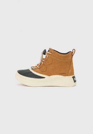 Waterproof ankle boot with a brown suede upper, black rubber toe, cream textured sole, and contrasting lace closures. Angled view.