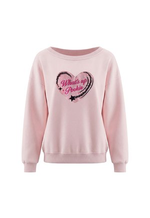 Lyserød sweatshirt med lange ærmer og ribmanchetter med et palietdekoreret hjerte og teksten "What's up Pookie" i midten.