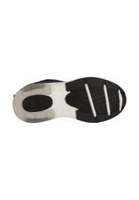 Zwarte sportieve schoen met een buitenzool van textuurrubber, voorzien van een flexibele witte tussenzool en meerdere tractiegroeven voor stabiliteit en grip.