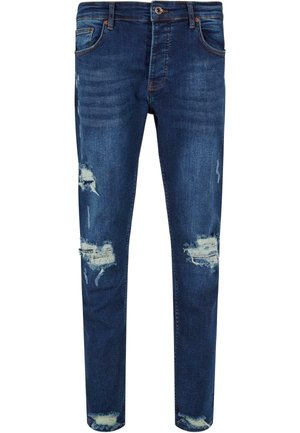 Blauwe denim jeans met een slim fit, voorzien van beschadigde patches en rafelige randen. Inclusief vijf zakken en een knoopsluiting.