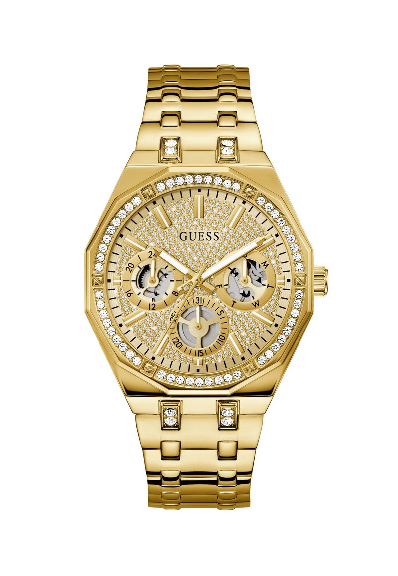 Montre octogonale dorée avec une lunette ornée de pierres précieuses, un cadran texturé, trois sous-cadrans et un bracelet en maillons avec des accents scintillants.