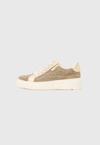 Sneakers with a textured light brown and gold woven upper, contrasting cream faux leather accents, and a thick white rubber sole.