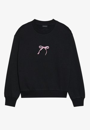 Sweatshirt noir en tissu doux, doté d'un nœud rose brodé sur le devant. Encolure ronde, manches longues et poignets côtelés.
