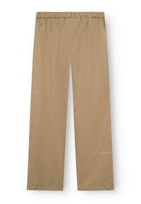 Pantalons beige à coupe ample avec taille élastique, jambes droites, petits boutons-pression en métal aux ourlets et logo "rethinkit" près de la cheville droite.