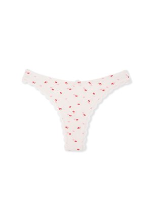 Perizoma bianco con bordo di pizzo smerlato, decorato con un motivo di piccole labbra rosse su uno sfondo in tessuto morbido.