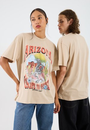 UNISEX - Print T-shirt - beige