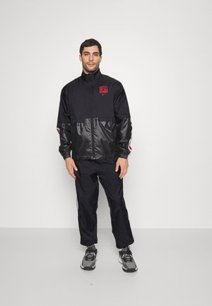 nike 2000s anzug