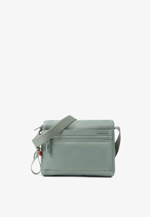 Lysegrøn Hedgren crossbody taske med frontlynlås, justerbar rem og lynlås træk på hvid baggrund.