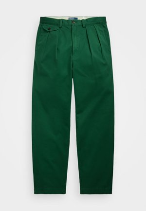 Green pleated trousers with a straight fit. Made of cotton, featuring a buttoned pocket and a smooth texture. Closure at the waist.