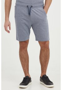 Blauwe heidig gekleurde shorts met een elastische tailleband, trekkoorddetails en zijzakken, gemaakt van zachte, lichte stof.