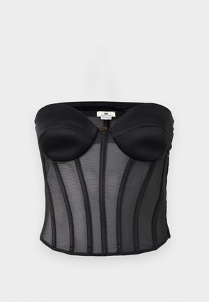 Bustier noir bustier sans bretelles avec bonnets rembourrés et panneaux en mesh semi-transparent comportant des baleines verticales pour la structure.