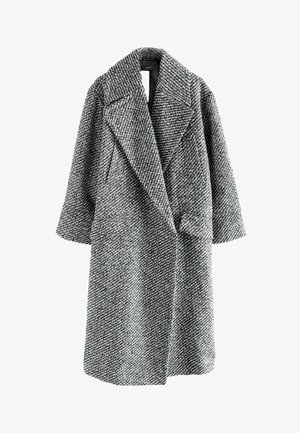 Gyapjú keverék kabát fekete-fehér houndstooth mintával, széles, kihagyott gallérral és rövid ujjakkal, laza, strukturált fazonnal.