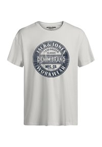 White, cotton t-shirt featuring a round graphic logo in navy blue with text: "JACK & JONES SANFORIZED CLASSIC DENIM BRAND MFG. CO. WORKWEAR."