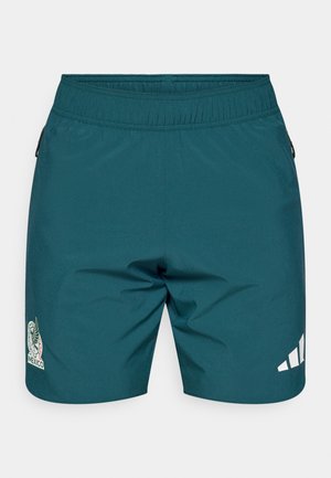 Pantalones cortos deportivos color azul verdoso con cintura elástica, que presentan un emblema de fútbol de México y rayas blancas de Adidas en la parte inferior derecha.